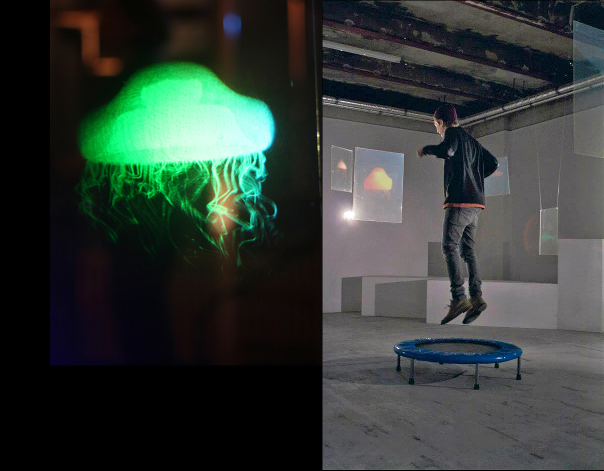 hologram installation Jumping Jellyfish, person on trampoline bouncing surrounded by vertically animated holographic jellyfish