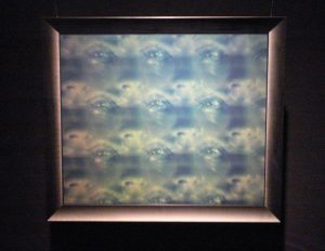 hologram from film footage of L'enfer showing Romy Schnider's eyes and nose through a prism